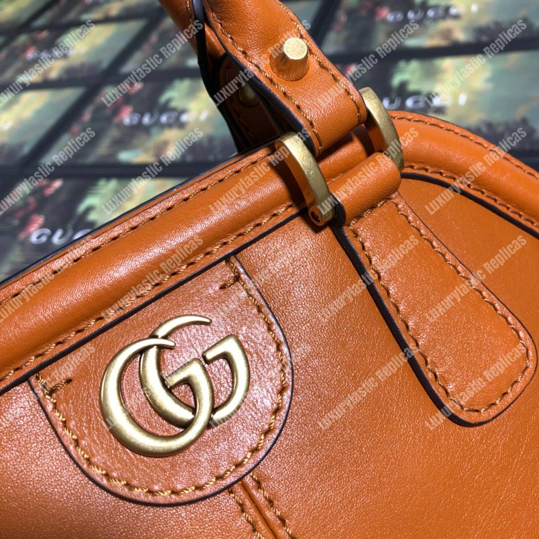 G*u*i re(belle) medium shoulder bag leather orange