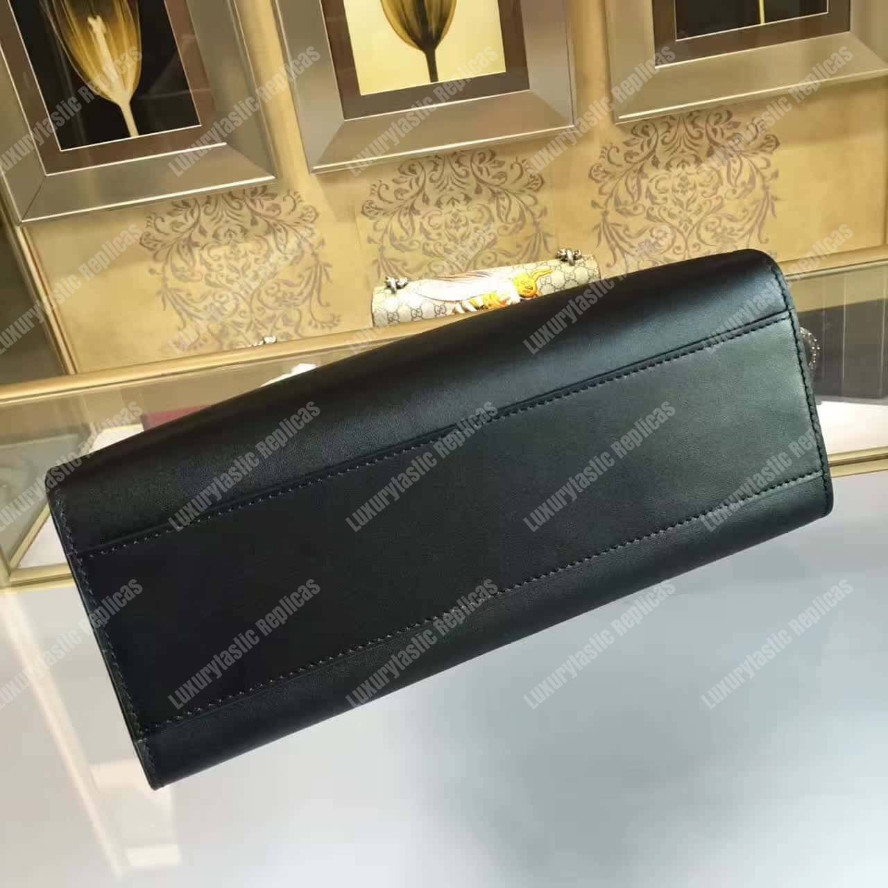 G*u*i nymphaea leather top handle bag