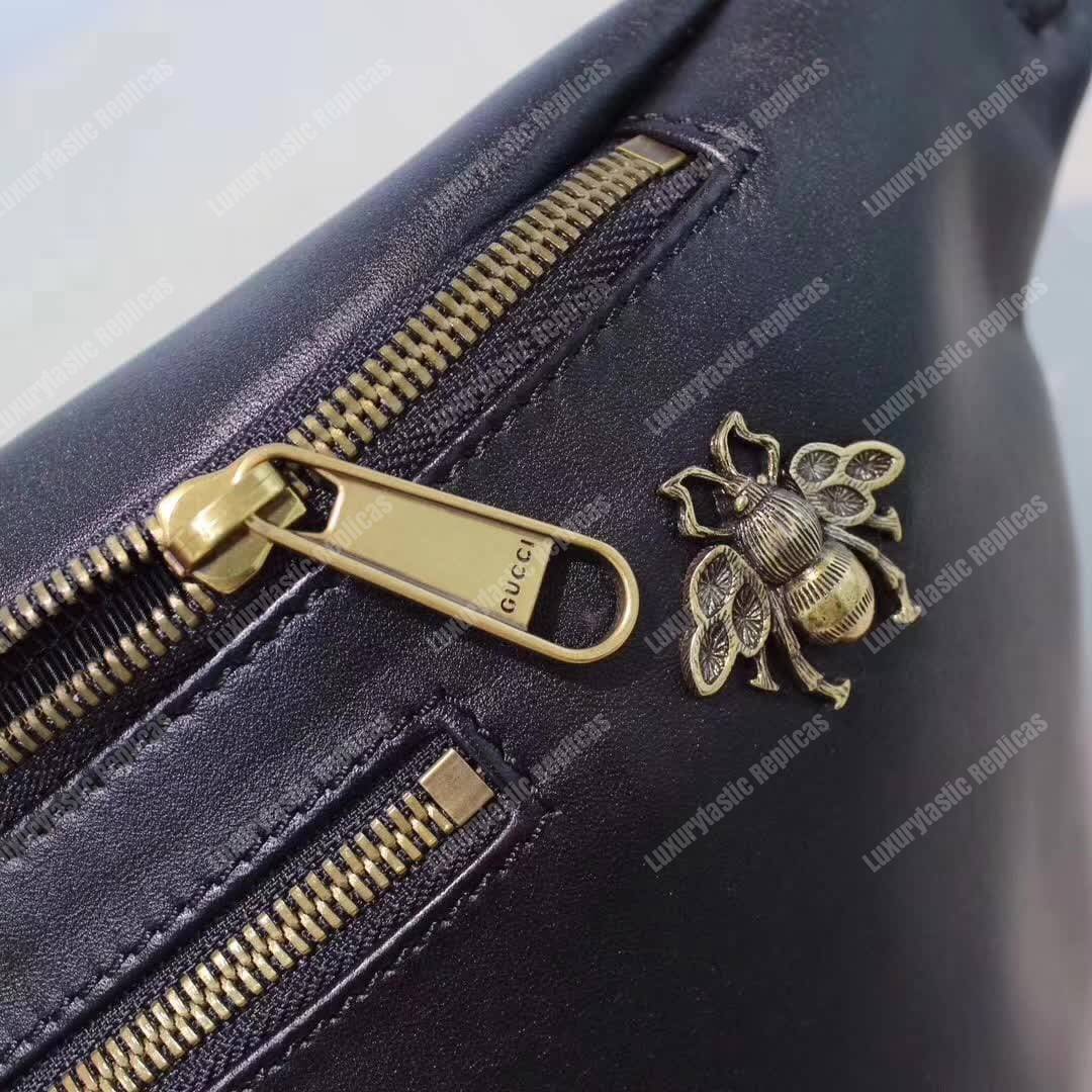G*u*i leather belt bag animal studs black