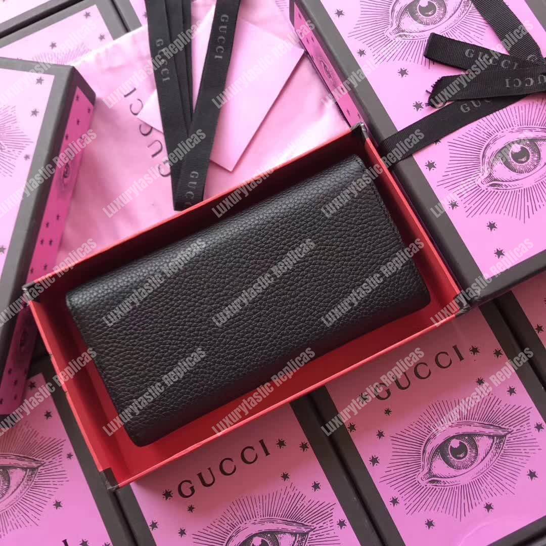 G*u*i leather wallet with bosco in black