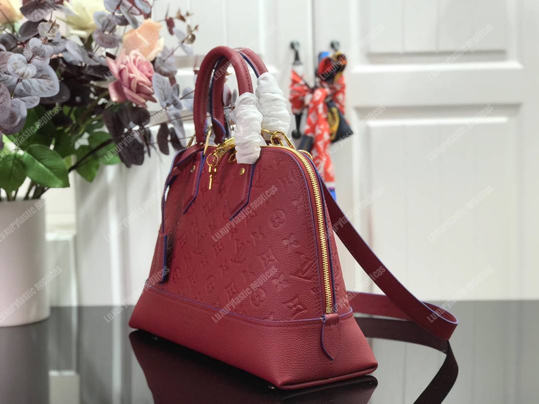 LV Neo Alma PM Monogram Empreinte Cherry Berry