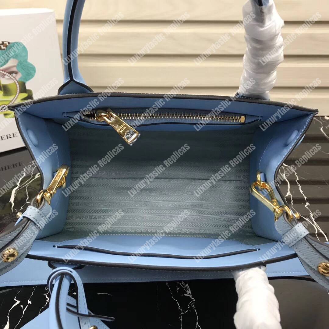 pra*a monoCh*0me saffiano leather bag light blue