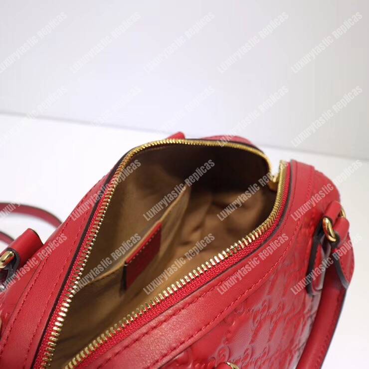 G*u*i signature small top handle bag red