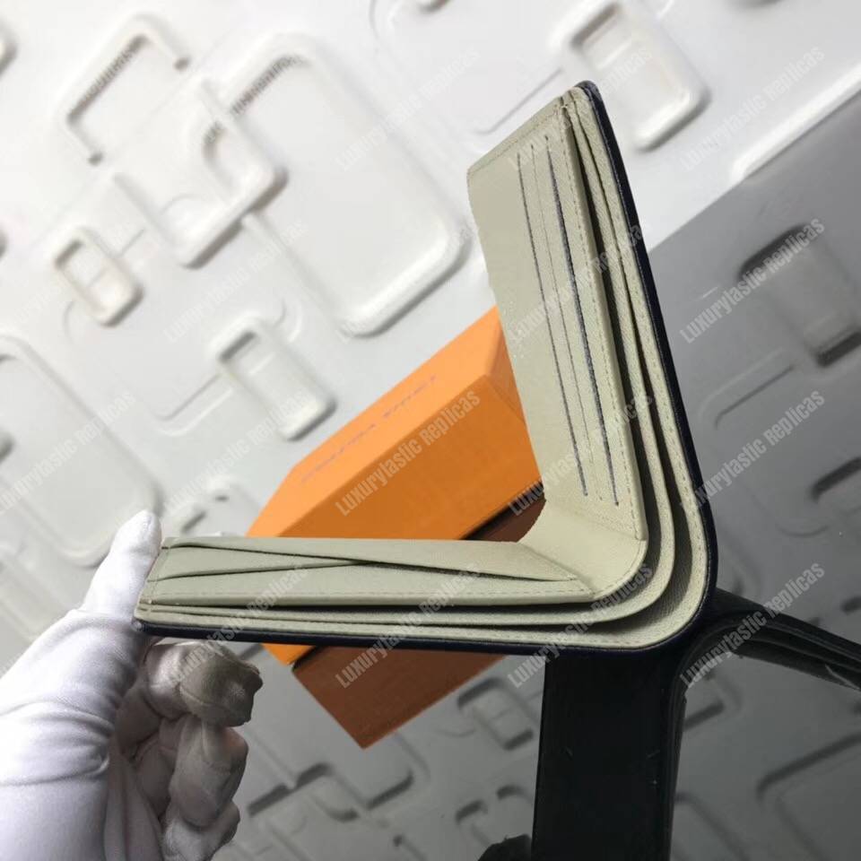 LV Multiple Wallet Taiga Leather Silver