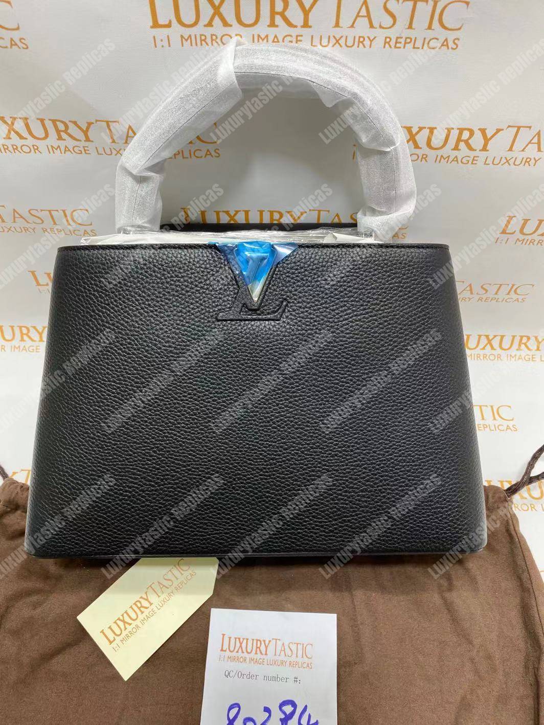 LV Capucines MM Taurillon Leather Noir Electric