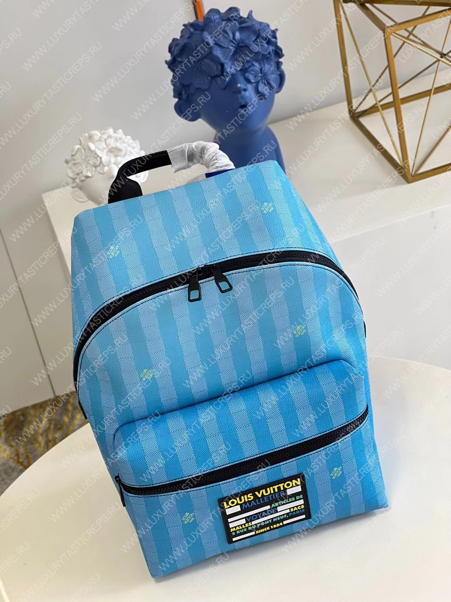 l**is V*t*n discovery backpack gradient blue m59913
