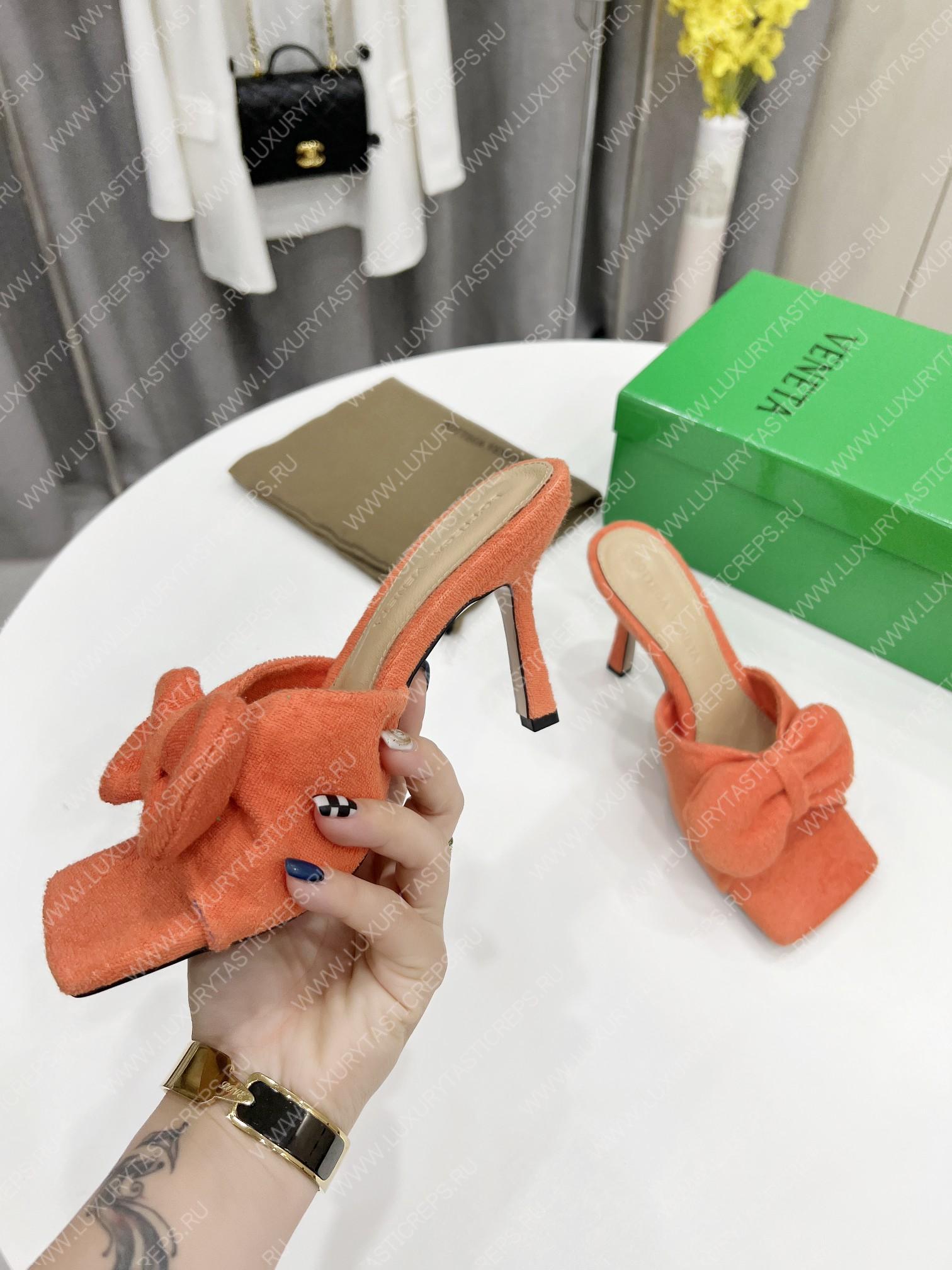 bo*te*ga Ve*ne*ta bow detailed heeled slides orange 690025v